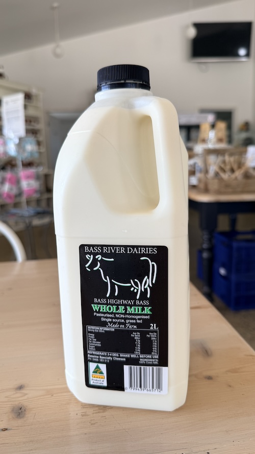 The original photo: a 2-litre bottle of Bass River Dairies whole milk on the shop counter, straight off a phone
